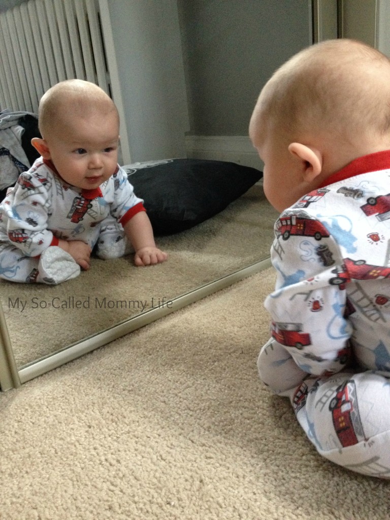 Little Dude loves looking at his reflection. It is so sweet watching him smile and coo at himself